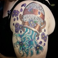 Nice colored shoulder tattoo of Aquarius symbol with flowers
