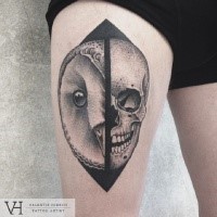 Nice designed by Valentin Hirsch thigh tattoo of split owl and human skull