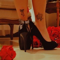 Nice elegant crown tattoo on foot for lady