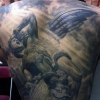 Nice great angel with snake tattoo on back