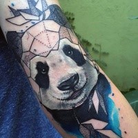 Nice looking colored arm tattoo of panda bear with leaves