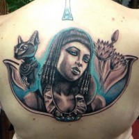 Nice looking colored Egypt woman tattoo on back combined with flowers and cat statue