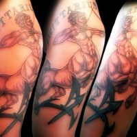 Nice looking colored Sagittarius tattoo with lettering and symbol