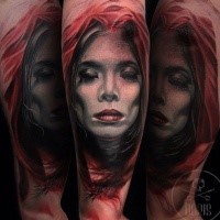Nice looking colored shoulder tattoo of spectacular looking woman in red hood