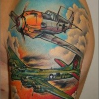 Nice looking colored shoulder tattoo of WW2 planes