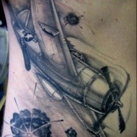 Nice looking detailed side tattoo of WW2 bomber plane