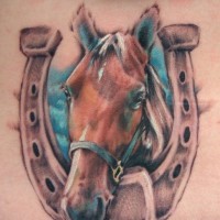 Nice lucky horseshoe and horse tattoo