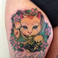 Nice new school style colored thigh tattoo of maneki neko japanese lucky cat with flowers and lettering