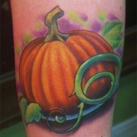 Nice orange pumpkin colored realistic detailed tattoo