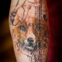 Nice painted and colored little fox with lettering tattoo on arm