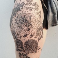 Nice painted black and white little cow tattoo on thigh with chrysanthemum flowers