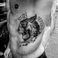 Nice painted black ink tiger with lettering tattoo on side
