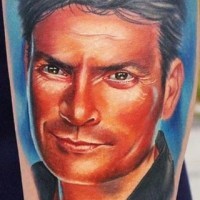 Nice painted realistic looking Hollywood actor portrait tattoo on leg