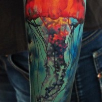 Nice red jellyfish tattoo on whole hand