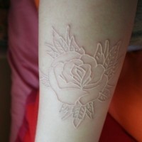 Nice rose skin scarification on arm