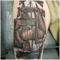 Nice ship tattoo on thigh