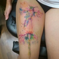 Nice watercolor bird tattoo on thigh