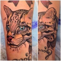 Nice watercolor head of a wild cat tattoo by Katie Sho