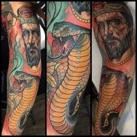 Noe traditional style colored sleeve tattoo of human face with big snake