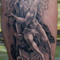 Old angel tattoo on leg