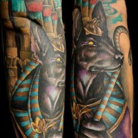 Old cartoon like colored sleeve tattoo of Egypt God Anubis