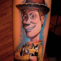 Altes cartoonisches buntes Unterarm Tattoo Cowboy aus Cartoon  Toy Story