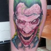 Old cartoon style colored creepy Joker face tattoo