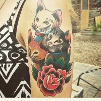 Old cartoon style colored shoulder tattoo of cute kittens with rose