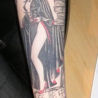 Old cartoons like colored forearm tattoo of seductive vampire woman