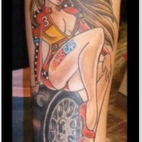 Old cartoons like colored seductive mechanic woman tattoo on arm