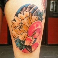 Old cartoons style colored flamingo tattoo on thigh combined with beautiful flower