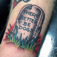 Old colored cracked gravestone with nice lettering tattoo