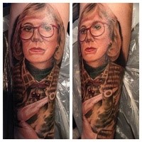 Old fashioned blond middle aged woman in glasses colored portrait tattoo in realism style
