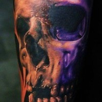 Old horror movie like very detailed colored big skull tattoo on arm