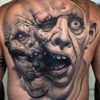 Old horror movie like very detailed colored on whole back tattoo of monster twin-face head