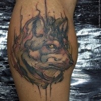 Old looking colored leg tattoo of steady wolf