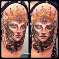 Old looking colored upper arm tattoo of mystical queen with crown by Jenna Kerr