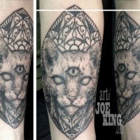 Old looking dot style tattoo of mysterious cat head with ornaments