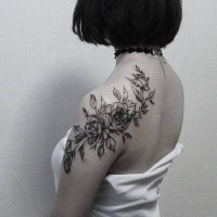 Old looking typical designed by Zihwa shoulder tattoo of roses and leaves