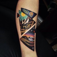 Old school big triangle shaped arm tattoo stylized with various night countrysides