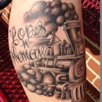 Old school black and gray style train tattoo on leg with lettering