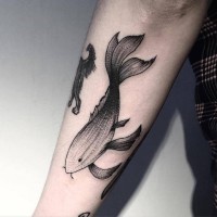 Old school black ink funny fish tattoo on forearm