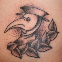 Old school black ink gentleman like bird tattoo combined with leaves