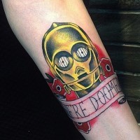Old school colored C3PO tattoo on forearm with flowers and lettering