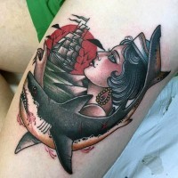 Old school colored sailor woman tattoo on thigh combined with bloody shark and sailing ship