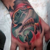 Old school colored shark head with waves