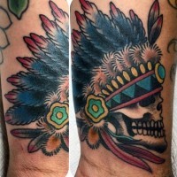 Old school colored tiny Indian skull with helmet tattoo