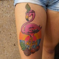 Old school colorful thigh tattoo of flamingo with various fruits