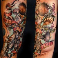 Old school colorful various spoons tattoo on arm with lettering