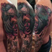 Old school half colored flying fantasy eagle tattoo on shoulder